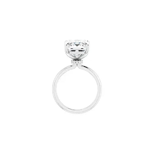 Hidden Halo with emerald centre stone in white gold, top view