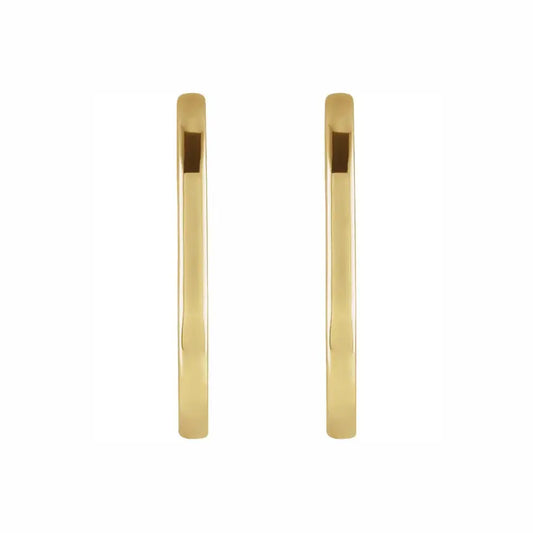 Oval huggies in yellow gold, front view