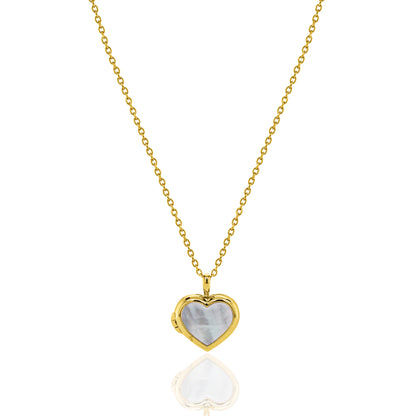 A gold heart-shaped pendant necklace with a white mother-of-pearl inlay, suspended from a delicate gold chain against a white background with a soft reflection below.