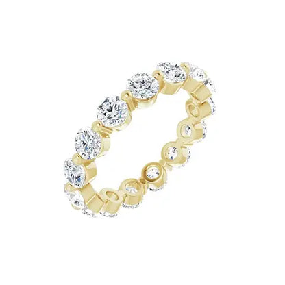 Bold Single Prong Eternity in yellow gold, angled view