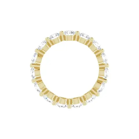 Bold Single Prong Eternity in yellow gold, top view