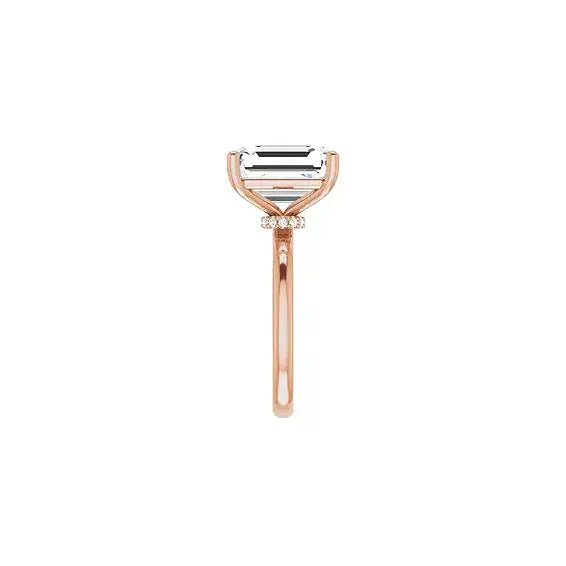 Hidden Halo with emerald centre stone in rose gold, side view