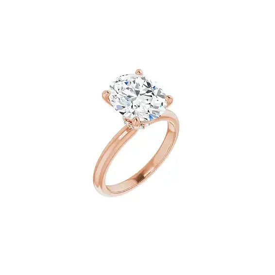 Hidden Halo with oval centre stone in rose gold, angled view