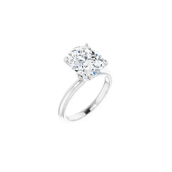 Hidden Halo with oval centre stone in white gold, angled view