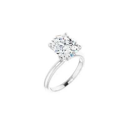 Hidden Halo with oval centre stone in white gold, angled view