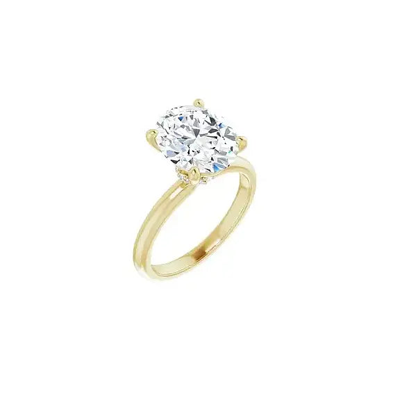 Hidden Halo with oval centre stone in yellow gold, angled view