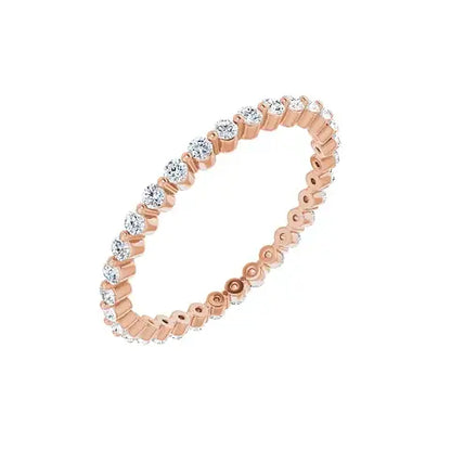 Petite Single Prong Eternity in rose gold, angled view