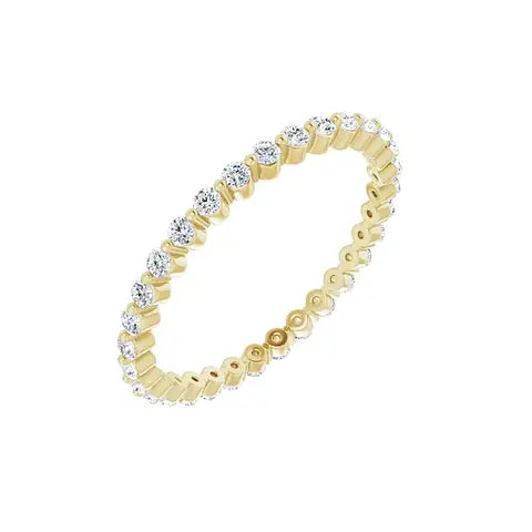 Petite Single Prong Eternity in yellow gold, angled view